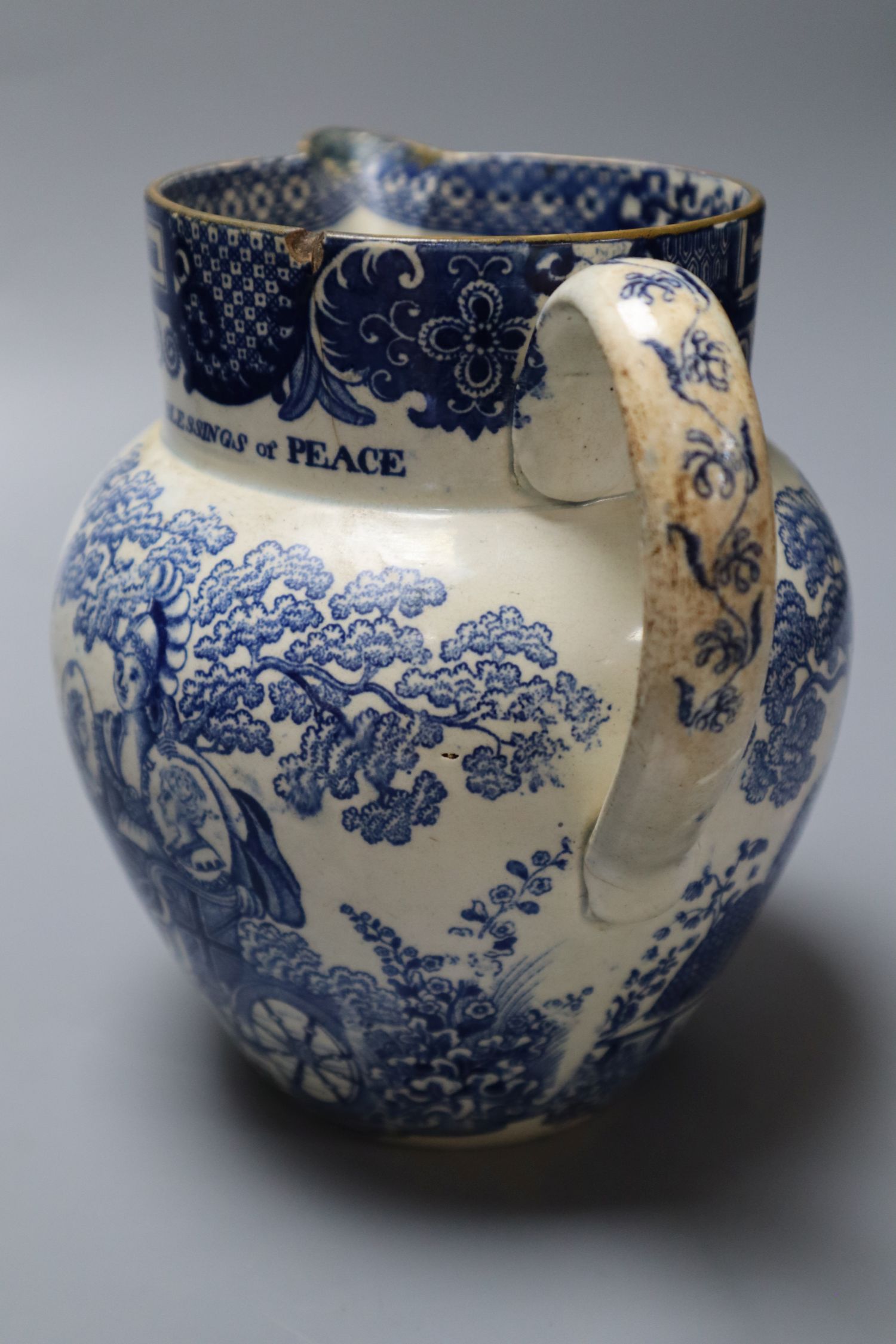 A rare pearlware jug commemorating the Peace of Amiens, c.1802, probably Swansea Pottery, 17cm